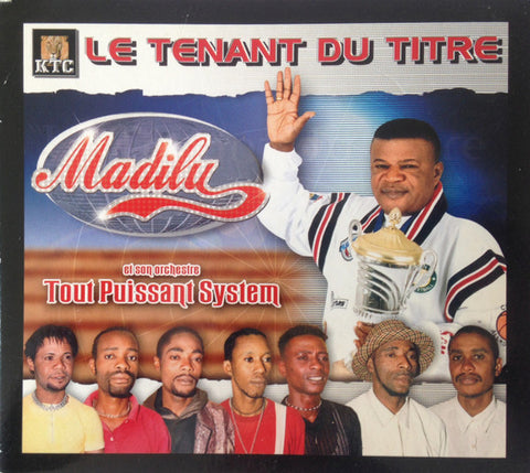 Madilu Et Son Orchestre Tout Puissant System - Le Tenant Du Titre