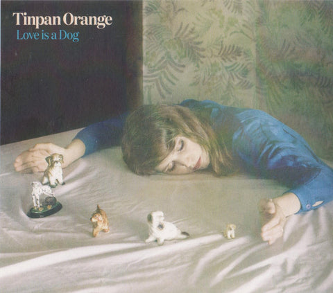 Tinpan Orange - Love Is A Dog